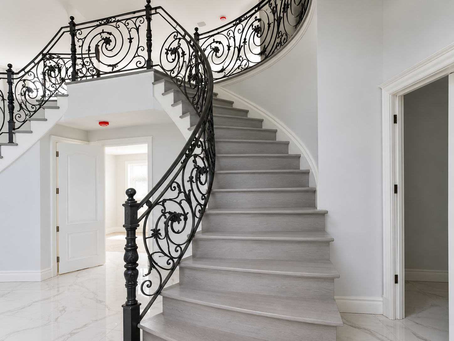 Curved wrought-iron staircase from a different angle