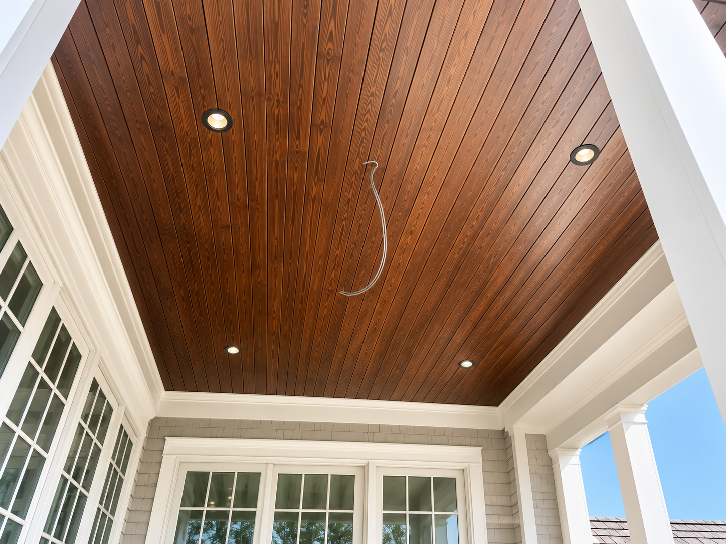 Wood porch ceiling close-up with recessed lighting